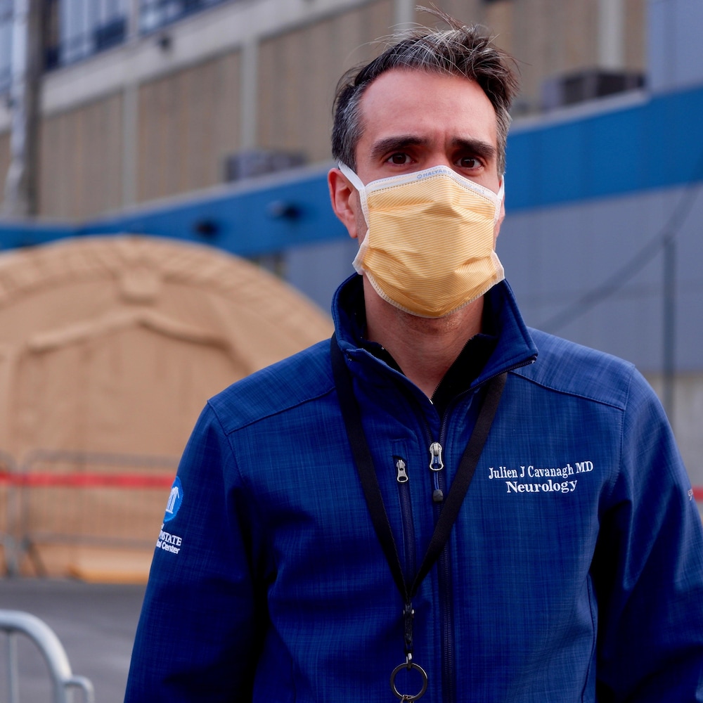 Doctor Julien Cavanagh, in front of a Brooklyn hospital.