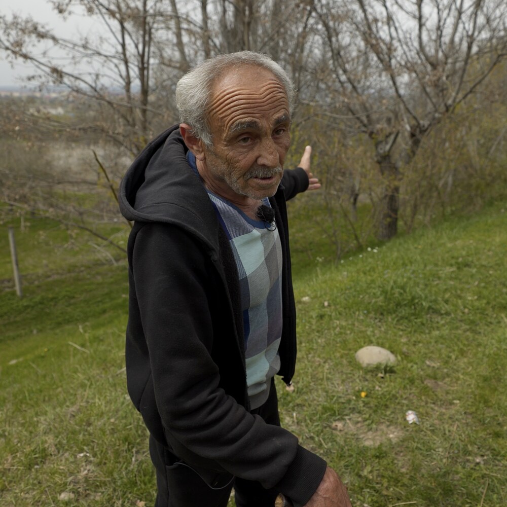 Otar pointed to the forest.