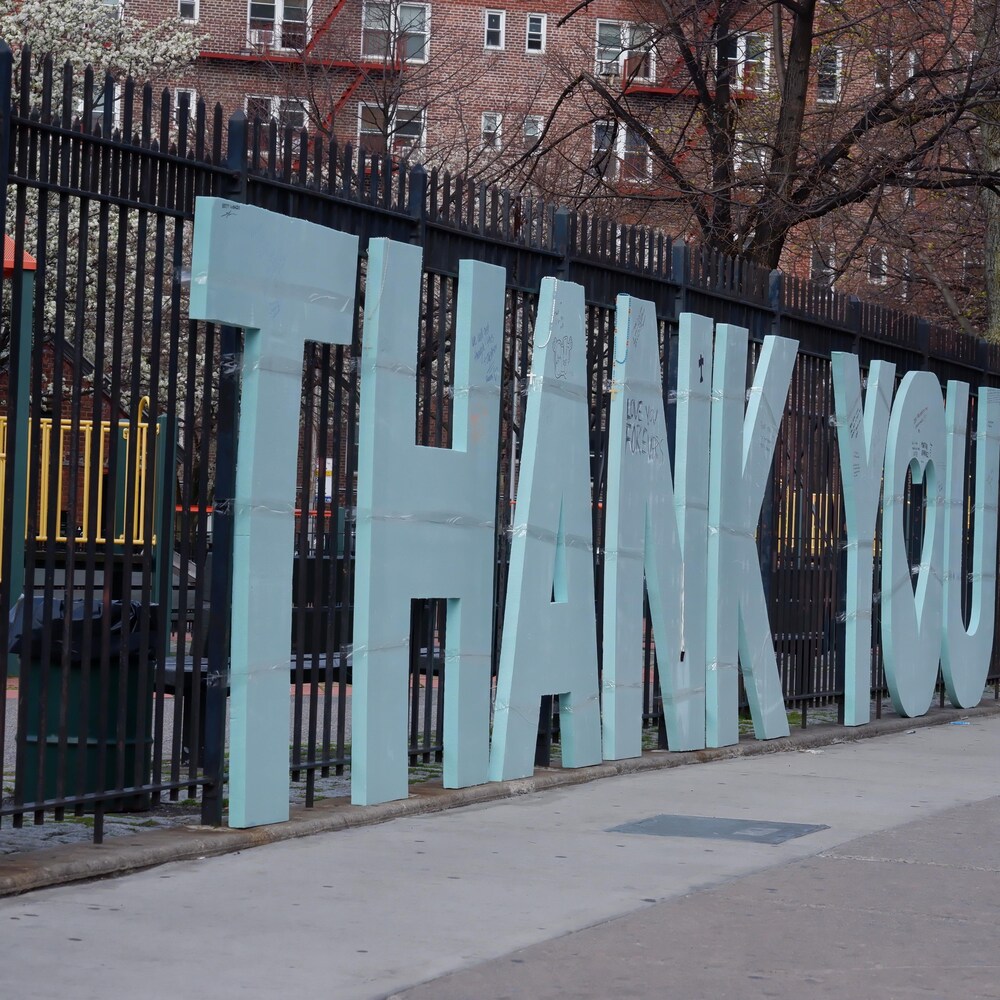 A message to health professionals in front of a New York hospital.