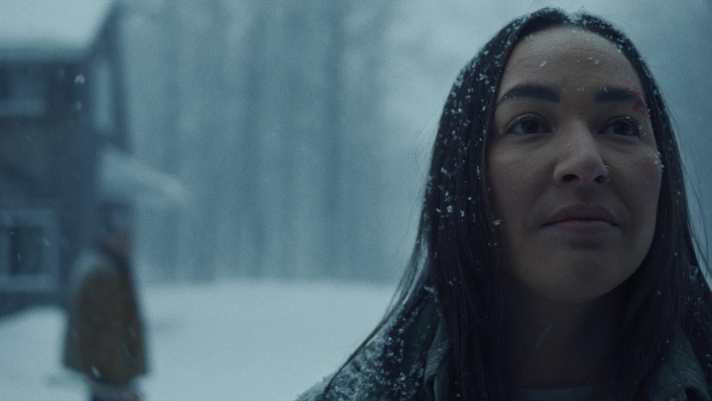 K-Films Amérique Une femme (Eve Ringuette) en gros program sous la neige.