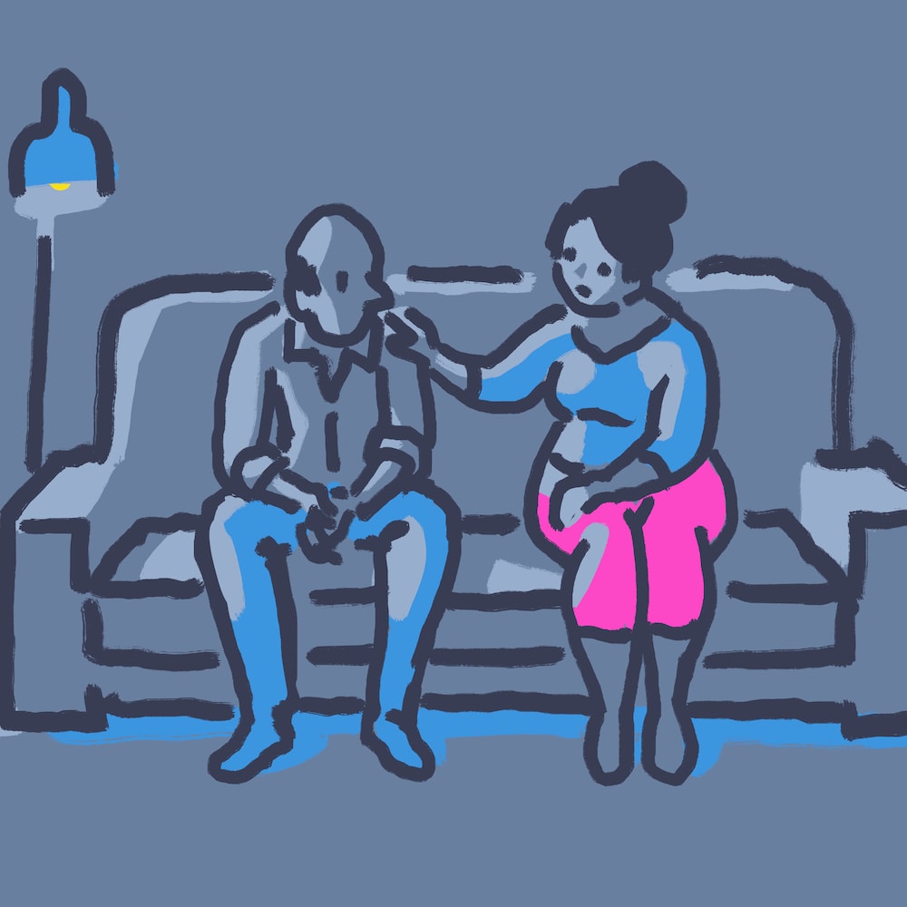 En dessin : une femme et un homme assis sur un divan. La femme met sa main sur l'épaule de l'homme.