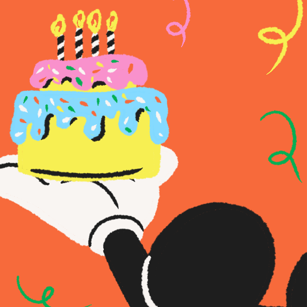 Une illustration de Mickey Mouse qui tient un gâteau de fête.