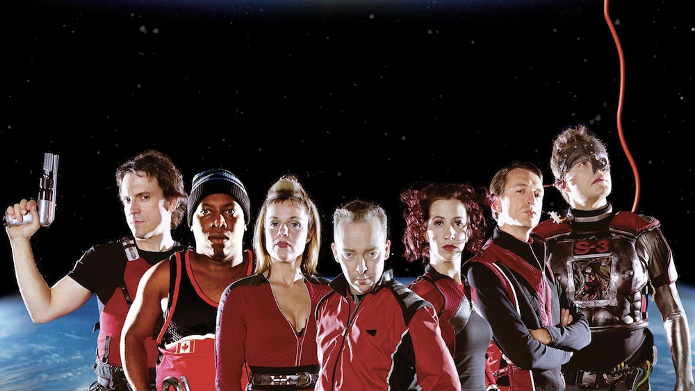 Visuel promotionnel du film Dans une galaxie près de chez vous avec Guy Jodoin, Stéphane Crête, Claude Legault, Sylvie Moreau, Didier Lucien, Mélanie Maynard et Réal Bossé.