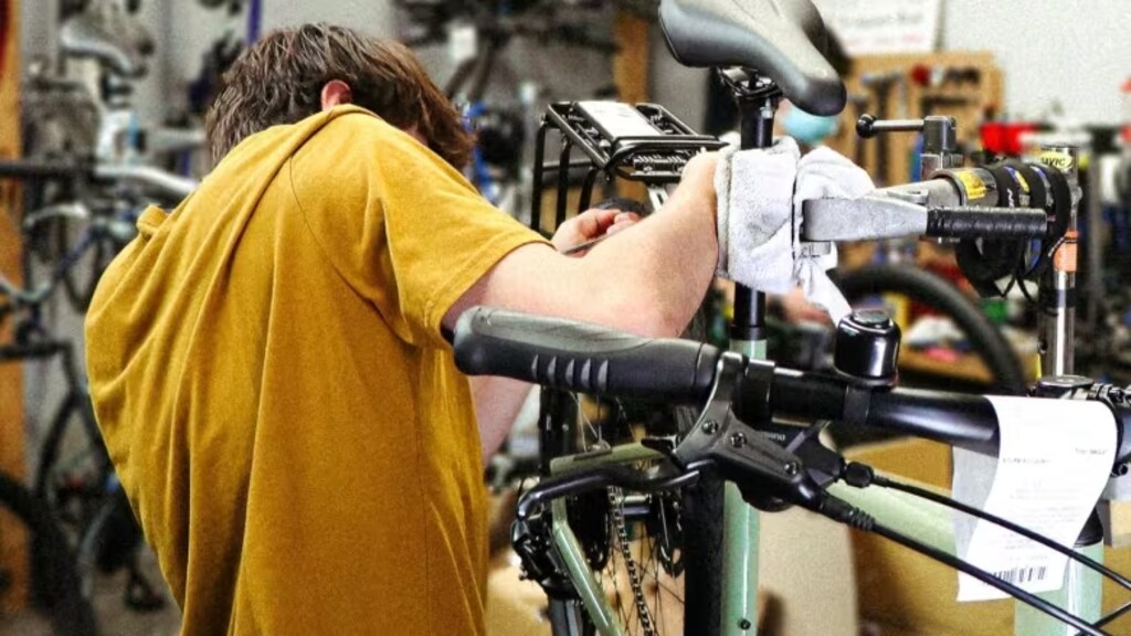 An employee works on a bike at Full Cycle in Ottawa.