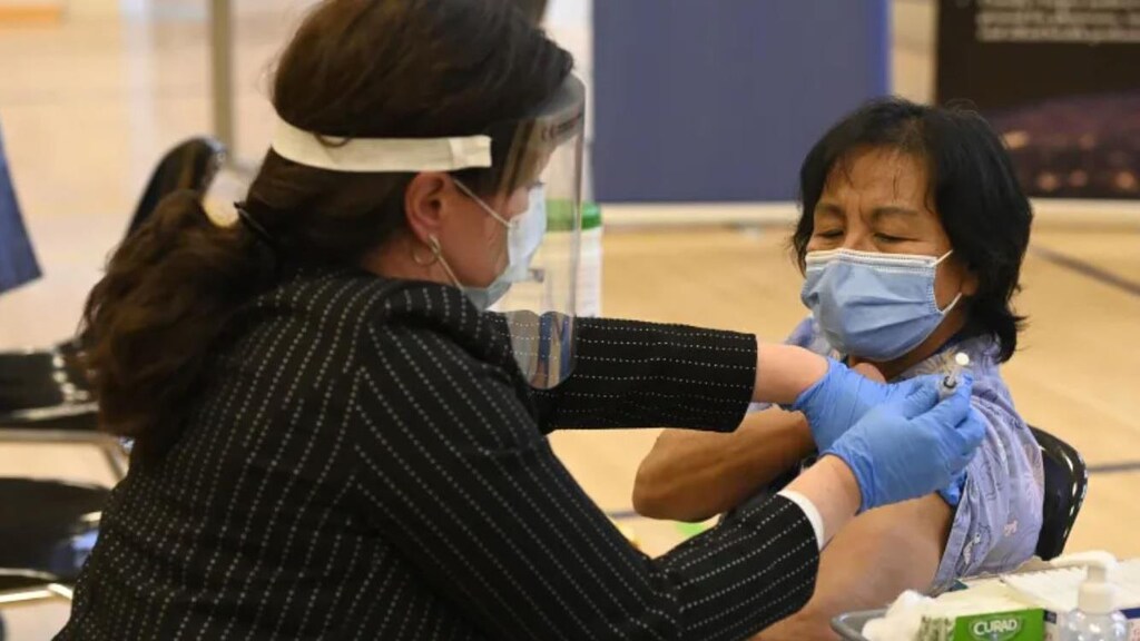 Building trust key to tackling vaccine hesitation among immigrants, say ...