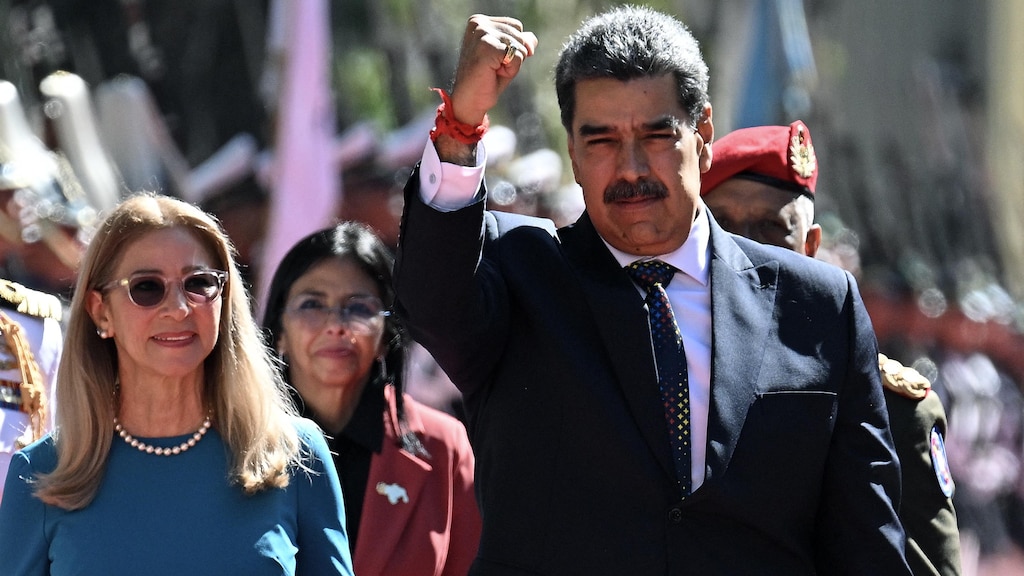 Venezuelan President Nicolás Maduro, centre right, and his wife, Cilia Flores, arrive at the National Assembly for his swearing-in ceremony for a third term, in Caracas on Friday.