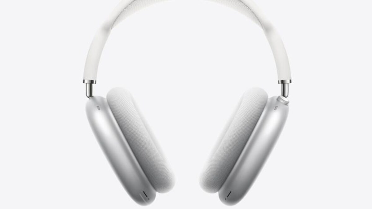 Casque d'écoute sans fil gris, vu de côté et de face.