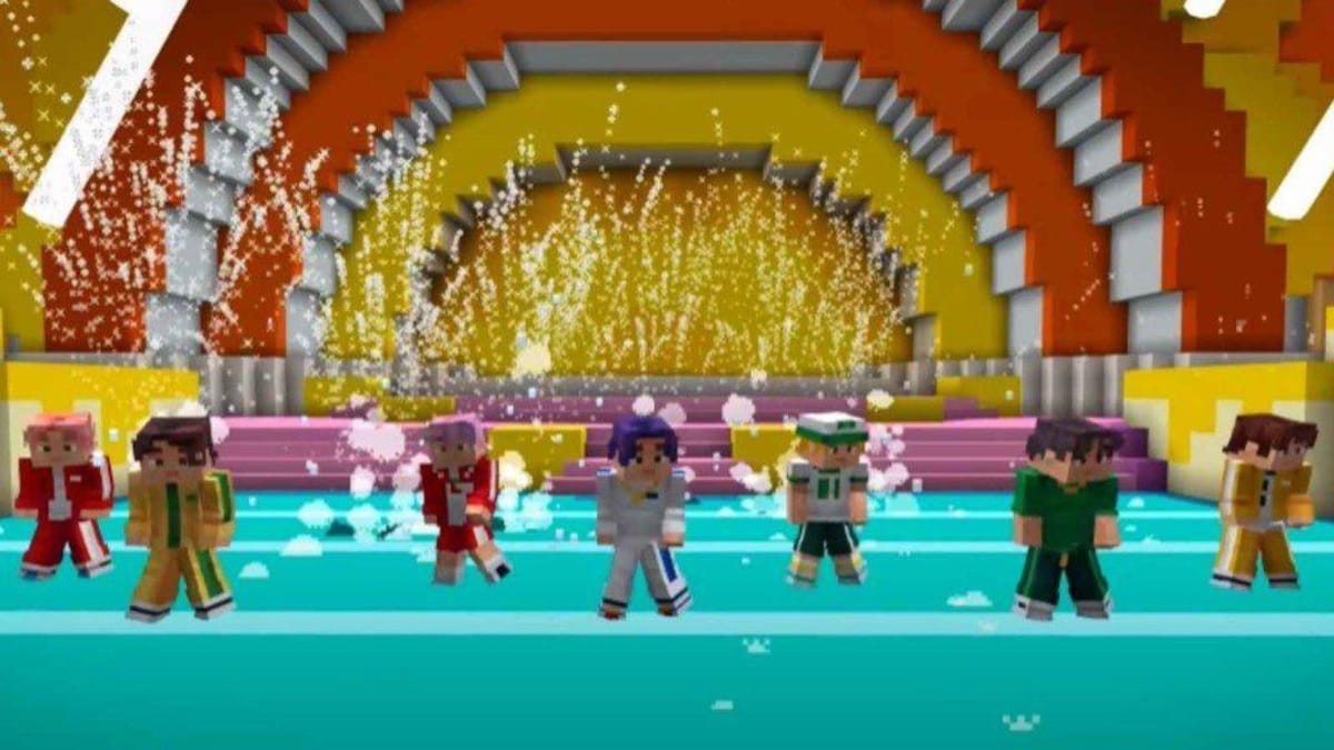 Des avatars tirés de l'univers du jeu vidéo minecraft performent un spectacle musical dans un amphithéâtre coloré. 