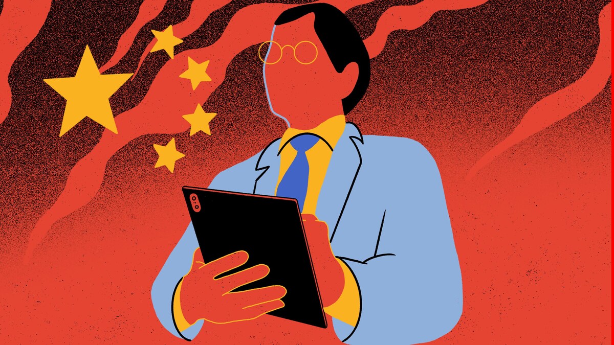 La silhouette d'un homme devant un drapeau chinois.