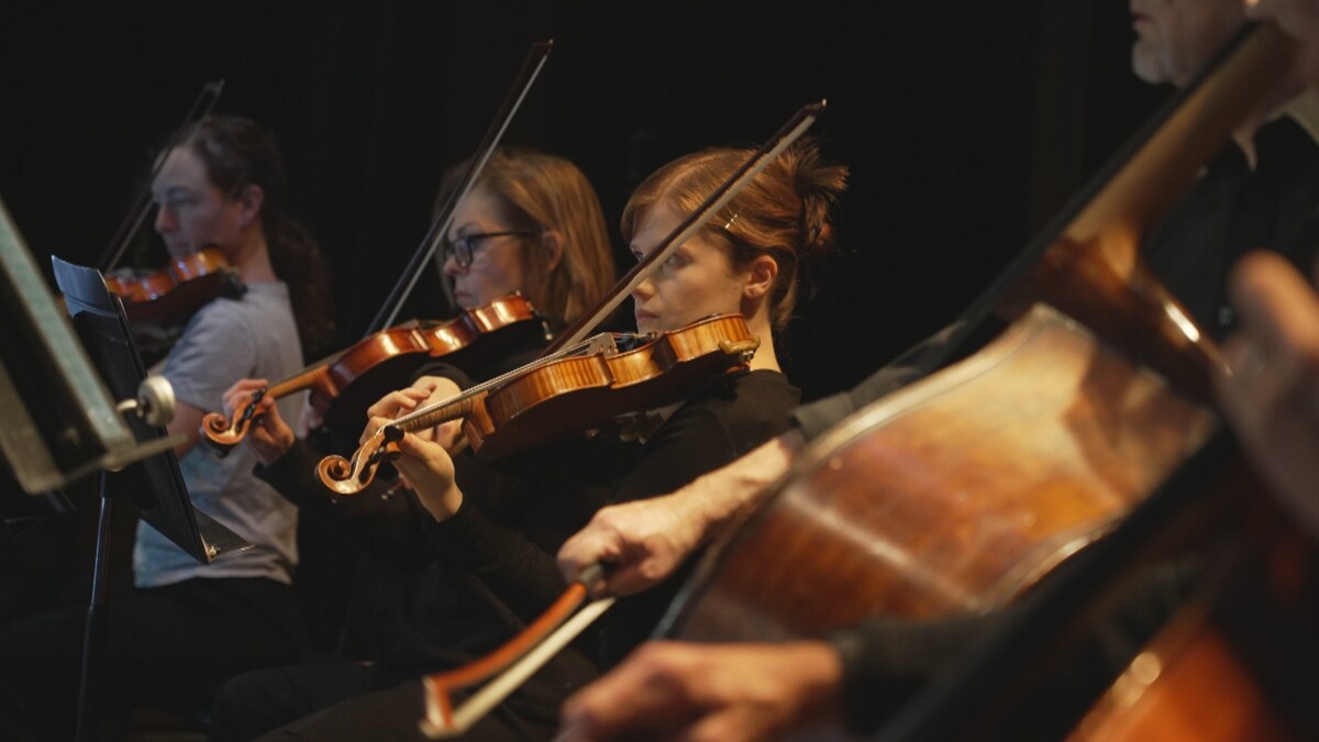 Des musiciens de La Sinfonia de Québec, lors d'une répétition.