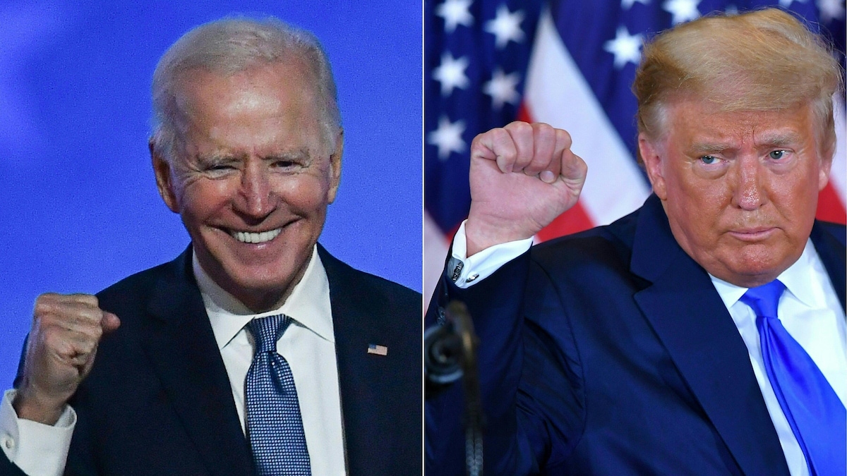 Joe Biden et Donald Trump brandissent le poing.