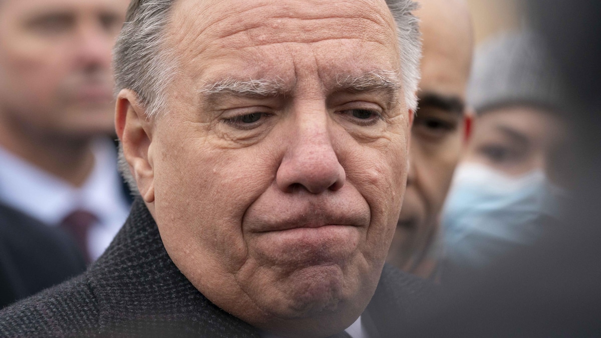 M. Legault pinçant les lèvres.