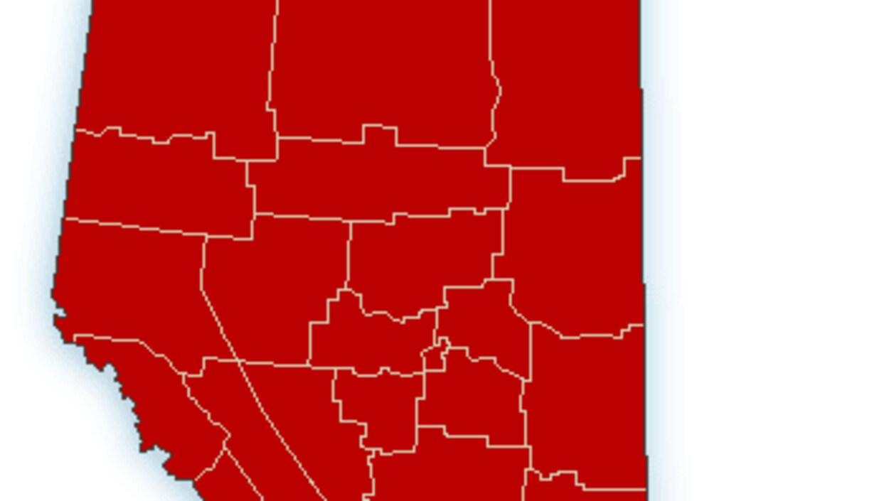 Une carte représente l'Alberta, presque entièrement colorée en rouge.