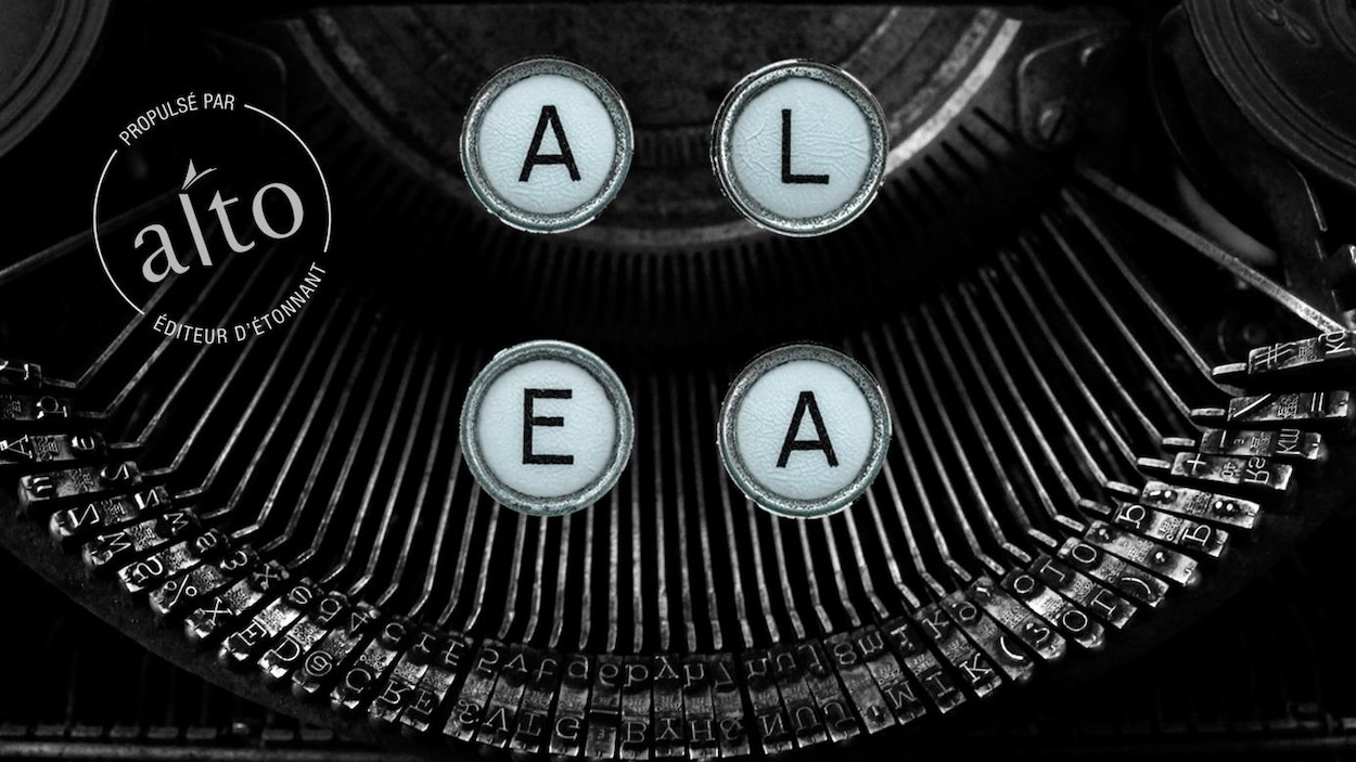 Les lettres A L E A sur un gros plan d'une ancienne machine à écrire.