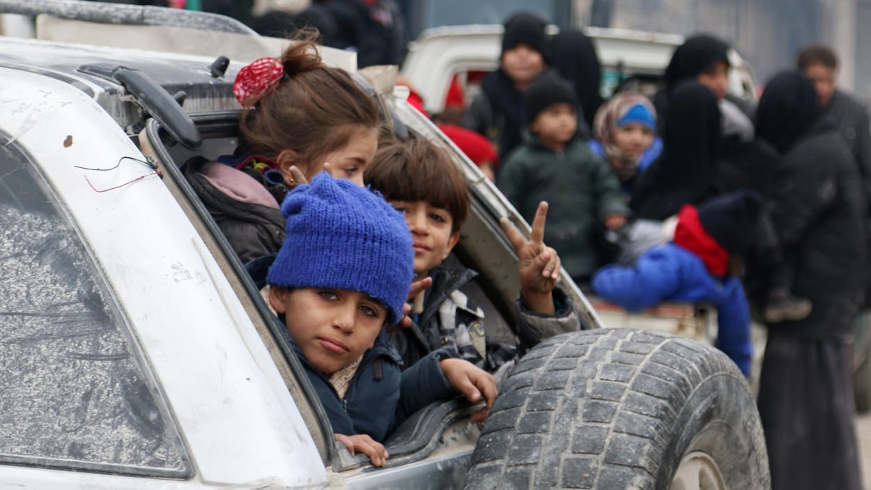 Des enfants attendant d'être évacués à Alep-Est, en Syrie, le 16 décembre dernier. Des enfants attendant d'être évacués à Alep-Est, en Syrie, le 16 décembre dernier.