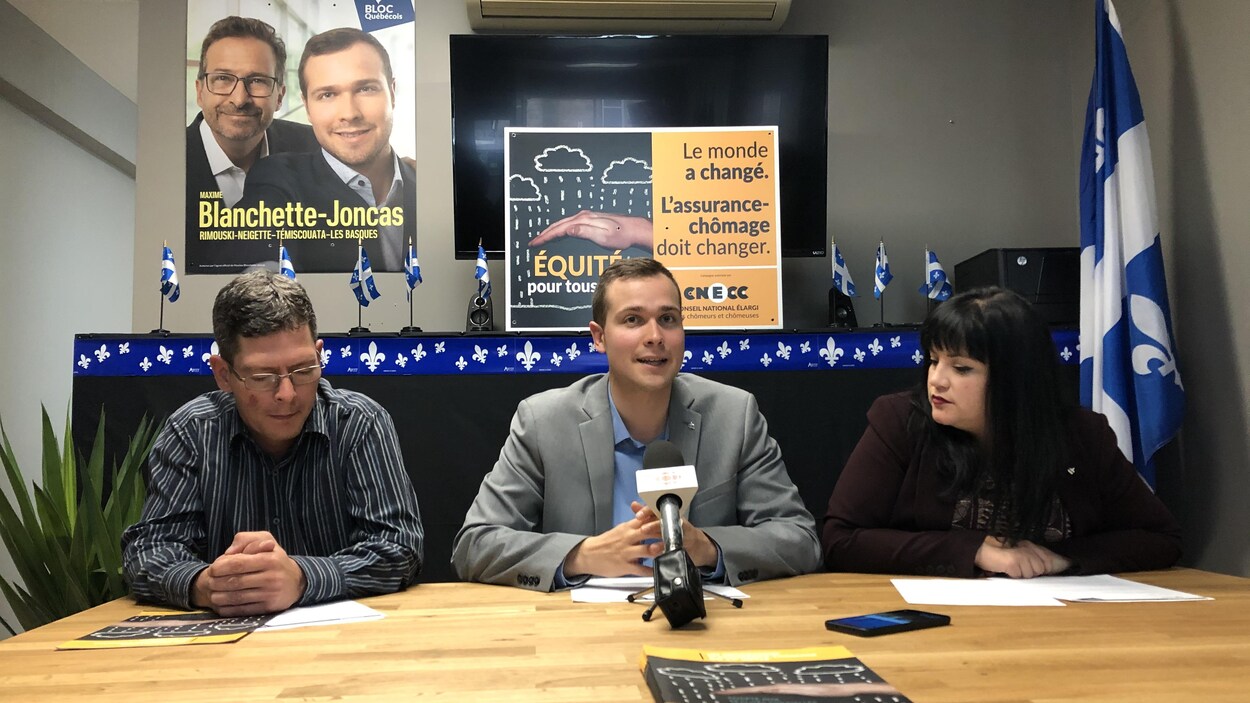 Les trois intervenants sont attablés lors d'un point de presse.