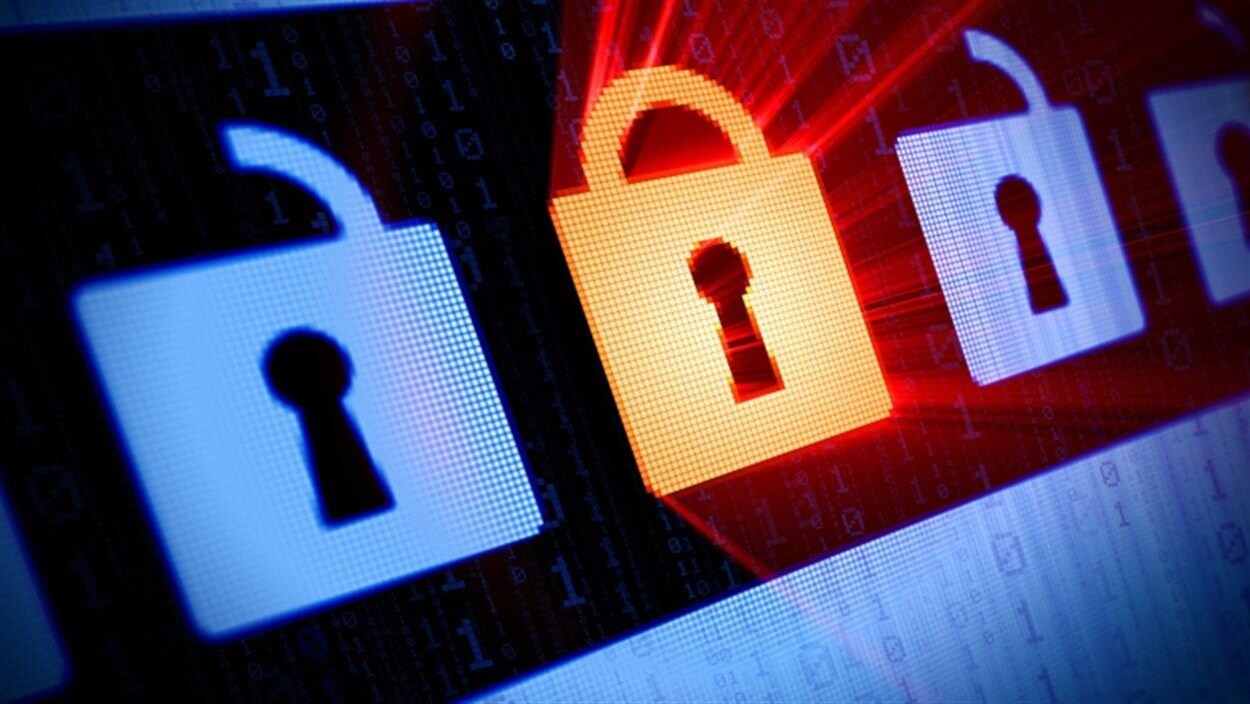 Un écran montant une série de cadenas et des données sous forme de chiffres zéros et uns.