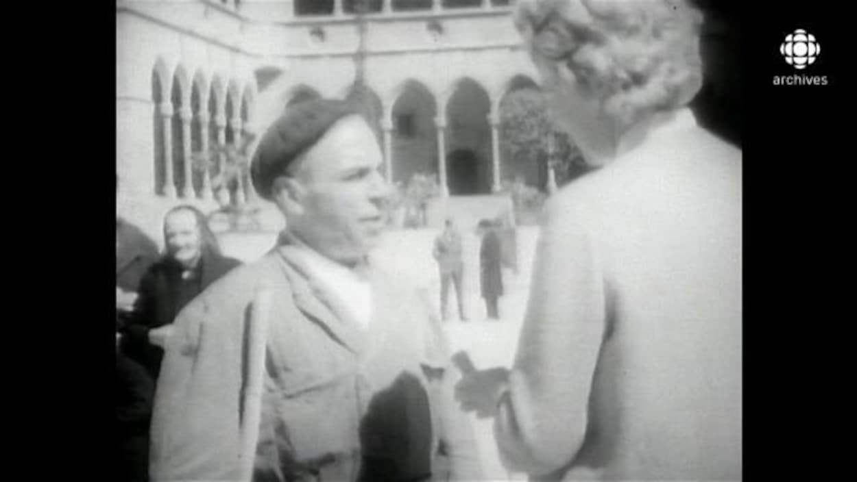 Judith Jasmin, devant un bâtiment typique de l'Espagne, interroge un catalan sur les différences entre les deux nations, catalane et castillane. Judith Jasmin, devant un bâtiment typique de l'Espagne, interroge un catalan sur les différences entre les deux nations, catalane et castillane.