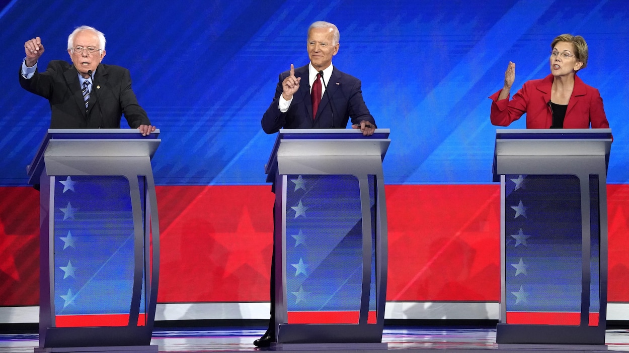 Bernie Sanders, Joe Biden et Elizabeth Warren lèvent tous la main pour prendre la parole.