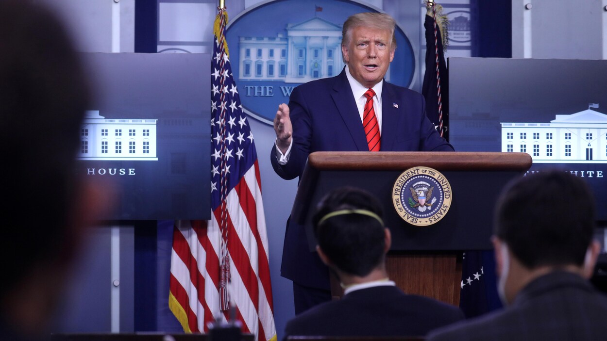 Le président américain répond aux questions des journalistes lors d'une conférence de presse organisée à la Maison-Blanche.