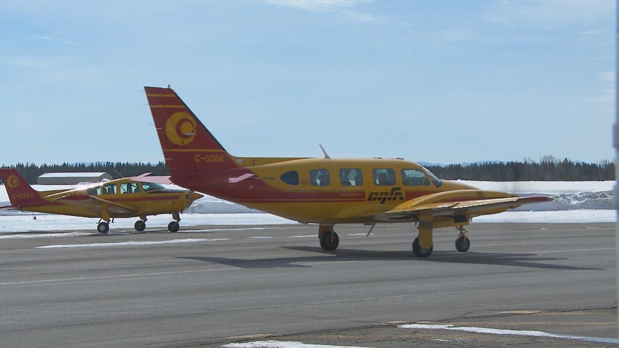 Deux avions du Centre québécois de formation aéronautique du Cégep de Chicoutimi à l'aéroport de Saint-Honoré Deux avions du Centre québécois de formation aéronautique du Cégep de Chicoutimi à l'aéroport de Saint-Honoré