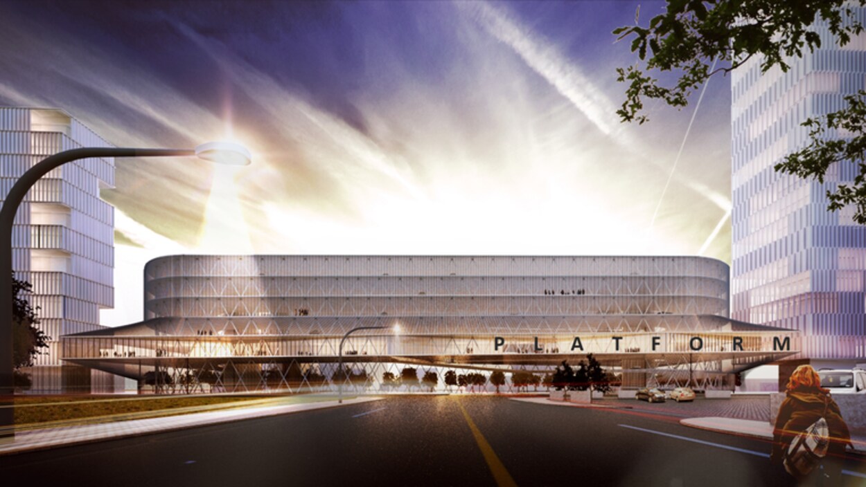 Image de synthèse du futur espace de stationnement qui sera situé dans le nouveau quartier du parc Victoria de Calgary. Il s'agit de gratte-ciels ceinturés de routes sur lesquelles circulent des voitures et des cyclistes.