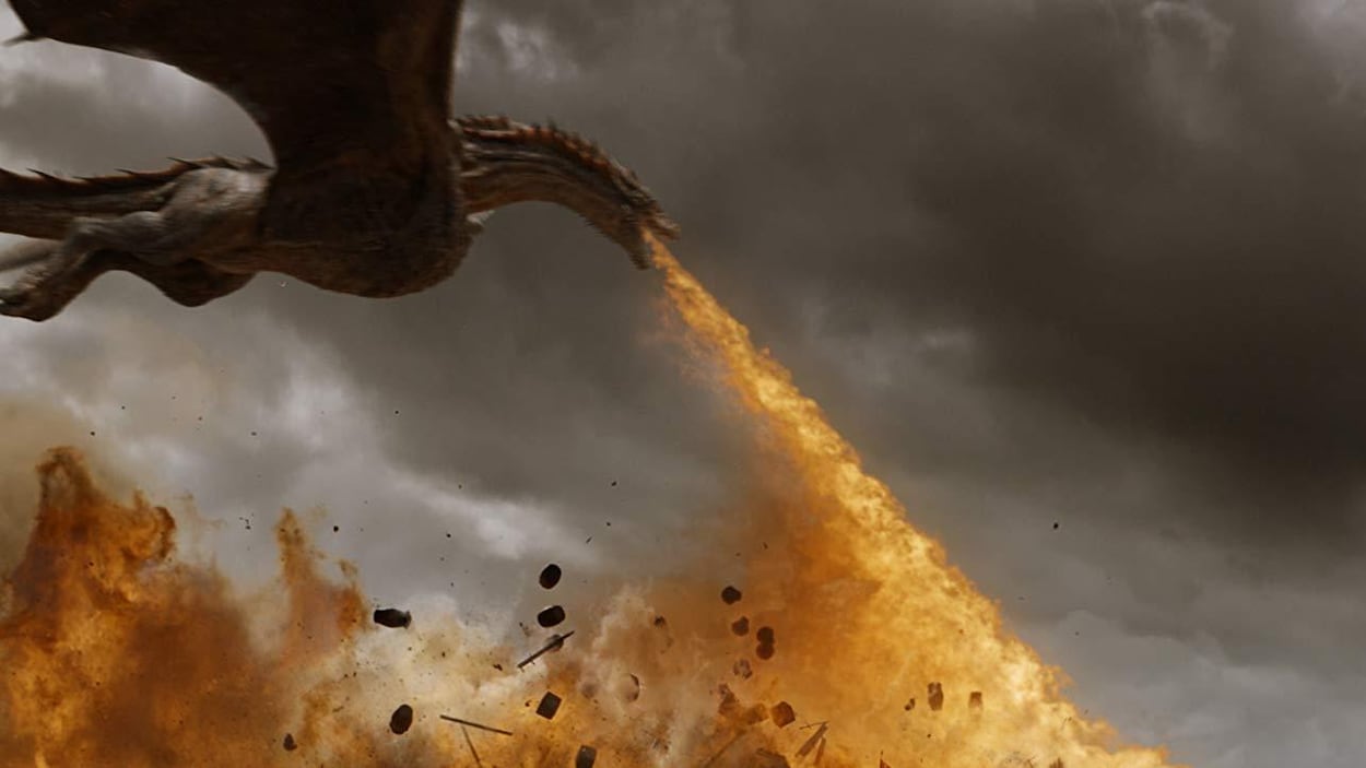 Un dragon crache du feu.