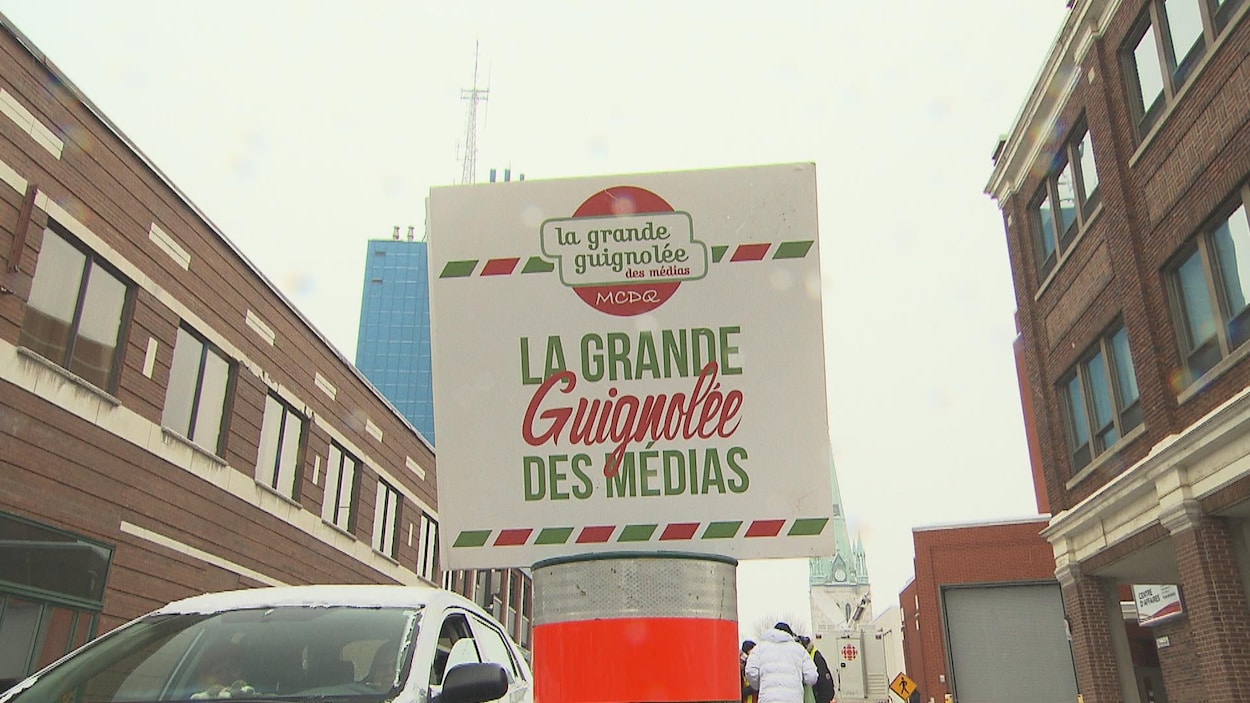 Une pancarte à un point de collecte de la Guignolée des médias à Trois-Rivières
