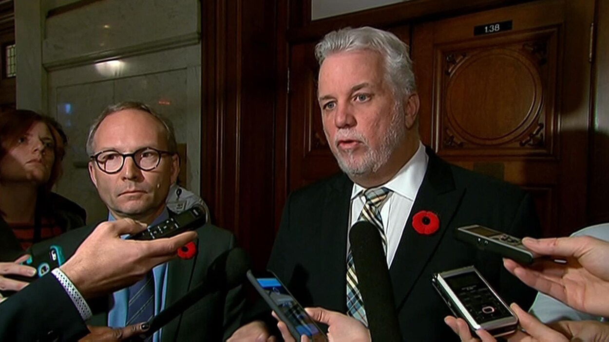 Le ministre de la Sécurité publique et le premier ministre Philippe répondent aux questions des journalistes sur l'affaire Guy Ouellette