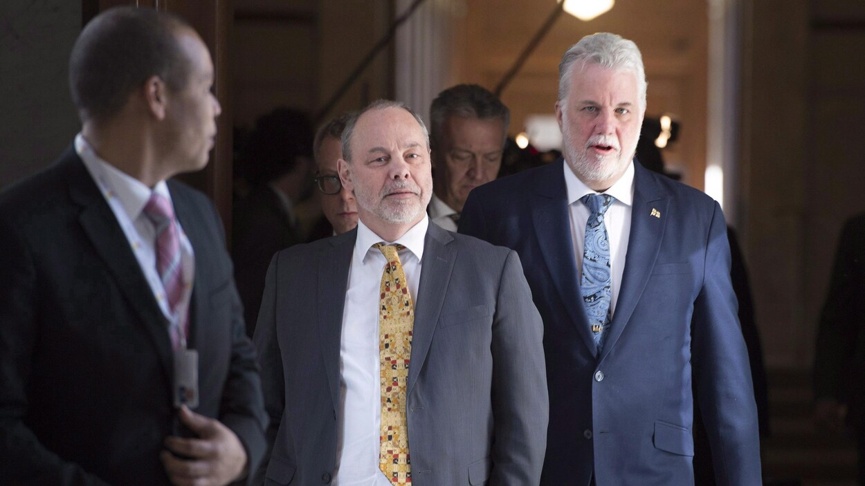 Le premier ministre Philippe Couillard et son chef de cabinet, Jean-Louis Dufresne