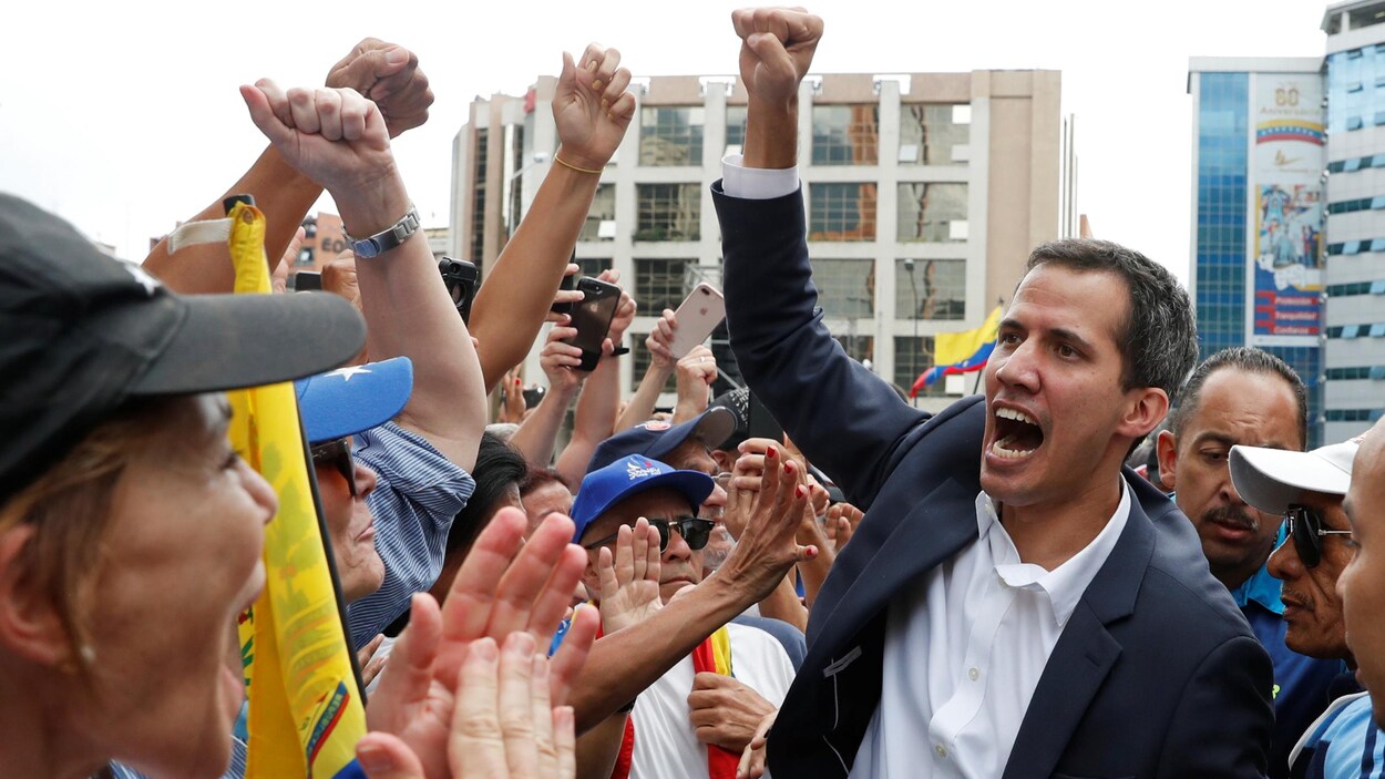 Juan Guaido, président de l'Assemblée nationale du Venezuela, réagit lors d'une manifestation contre le gouvernement du président vénézuélien Nicolas Maduro , à Caracas au Venezuela, le 23 janvier 2019. 