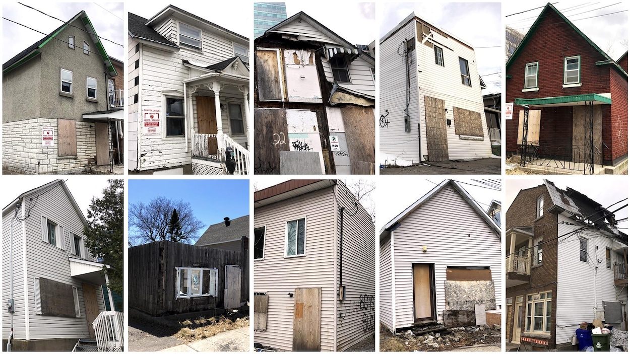 Photo de dix maisons abandonnées et placardées dans le Vieux-Hull.