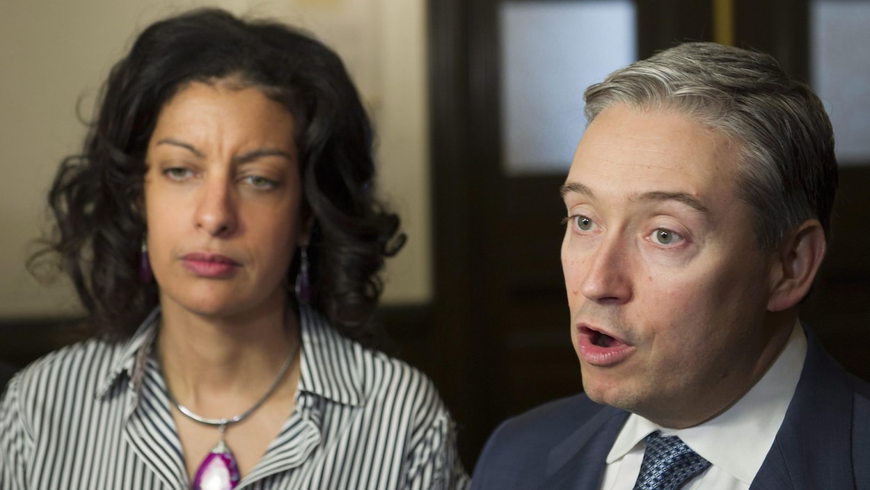 Francois-Philippe Champagne et Dominique Anglade parlent aux journalistes. Francois-Philippe Champagne et Dominique Anglade parlent aux journalistes.