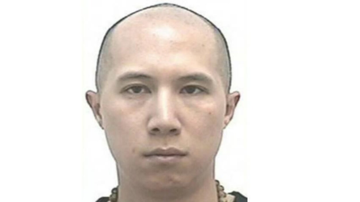 Photo de Nick Chan sans aucune expression. Photo de Nick Chan sans aucune expression.