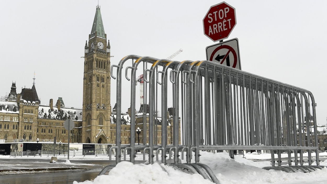 Fencing is seen on Parliament Hill in Ottawa, one year after the Freedom Convoy protests took place, on Friday, Jan. 27, 2023. THE CANADIAN PRESS/Justin Tang