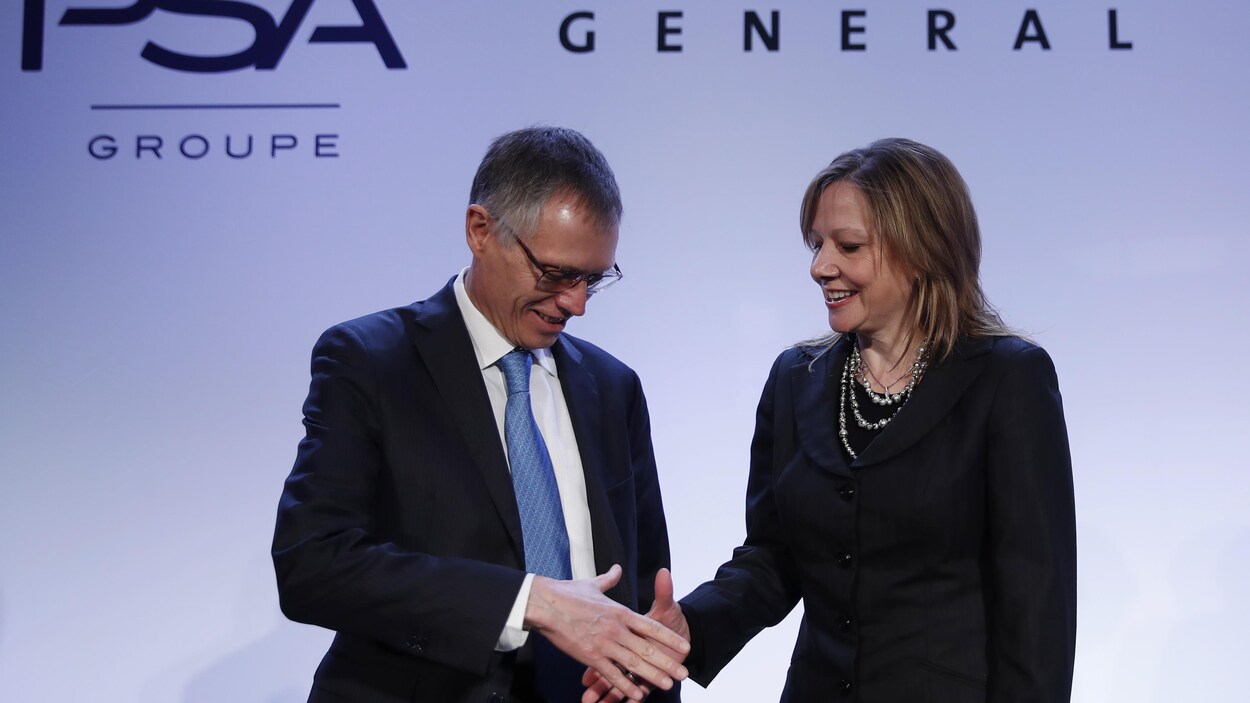 Le chef de la direction de PSA, Carlos Tavares, et Mary Barra, de General Motors