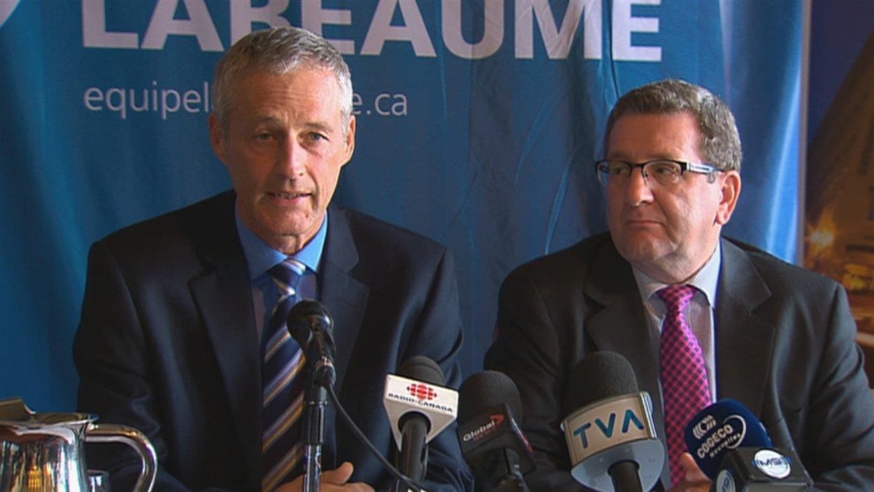 Richard Côté et Régis Labeaume lors d'un point de presse en 2013
