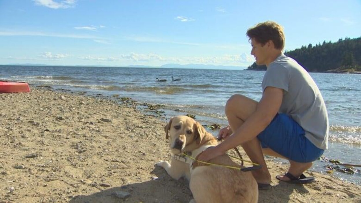 Visually Impaired Swimmer Raises Funds for Canadian Guide Dogs for the