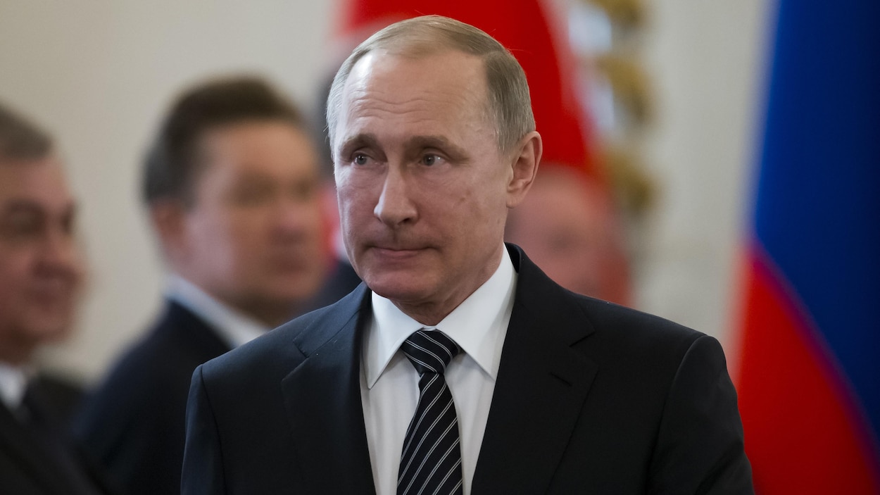 Le président russe Vladimir Poutine arrive à une rencontre au Kremlin, à Moscou. Le président russe Vladimir Poutine arrive à une rencontre au Kremlin, à Moscou.
