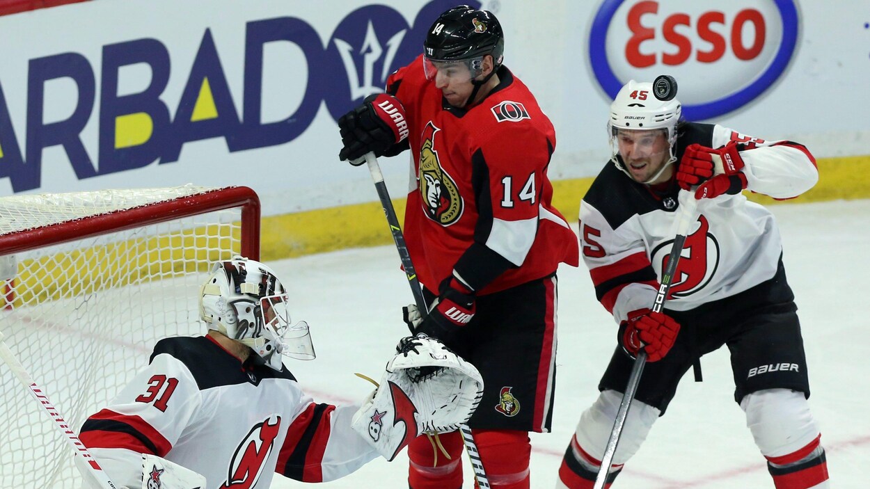 Alex Burrows (au centre) Alex Burrows (au centre)