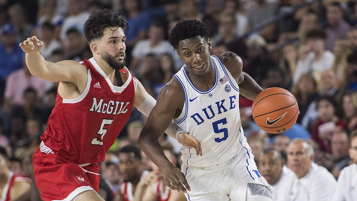 Alex Paquin (à gauche) et R.J. Barrett