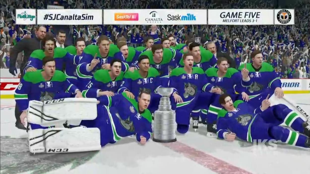 Capture d'écran du jeu vidéo NHL 20 avec les joueurs des Mustangs qui célèbrent leur championnat.