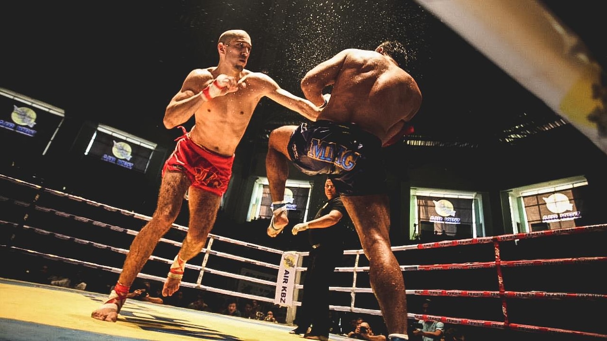 Dave Leduc (gauche) contre Tun Tun Min Dave Leduc (gauche) contre Tun Tun Min