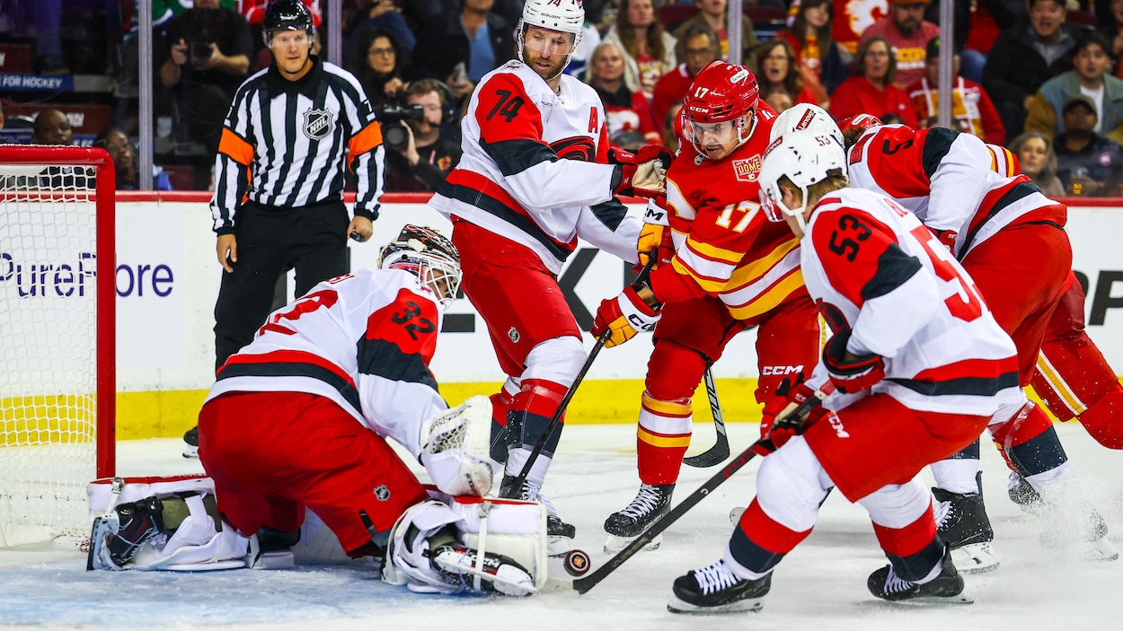 Les Flames freinent les Hurricanes