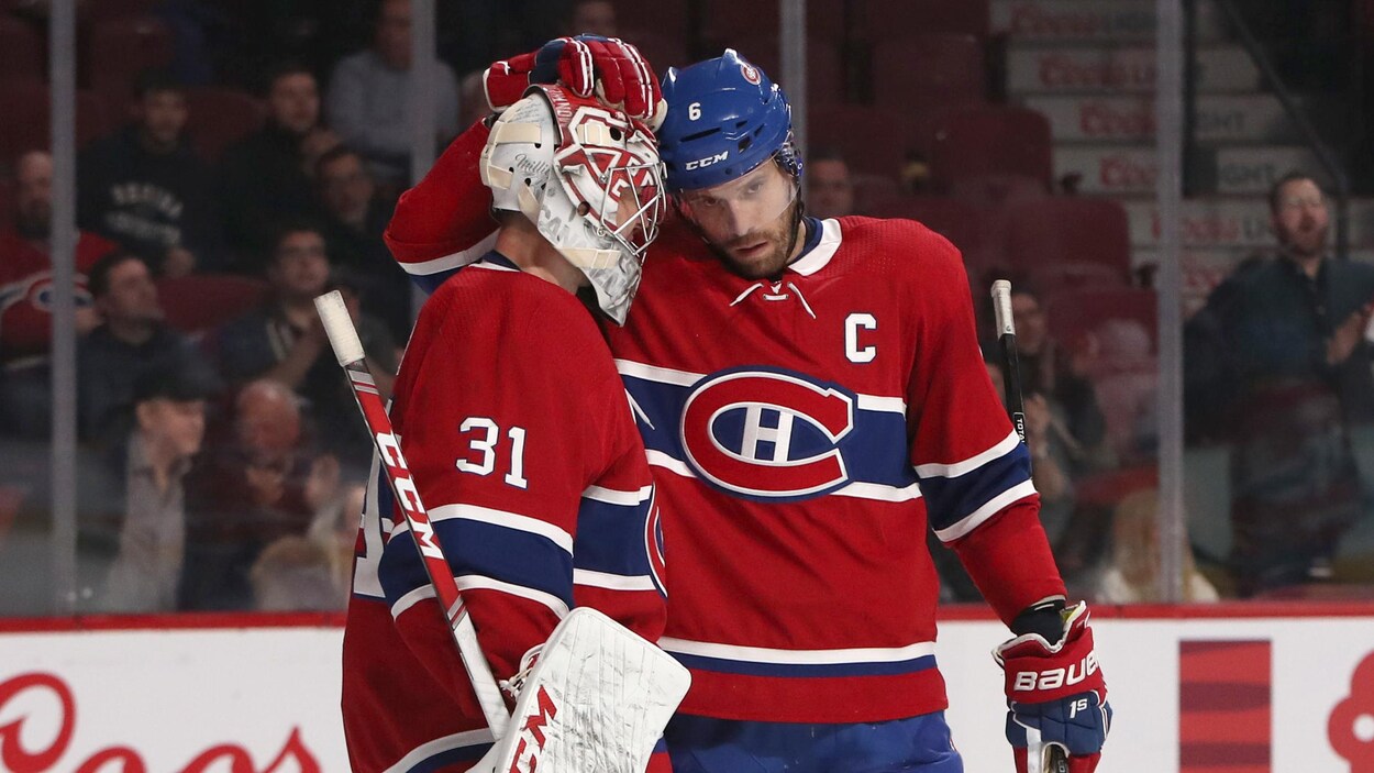 Shea Weber pose sa tête contre celle de Carey Price.