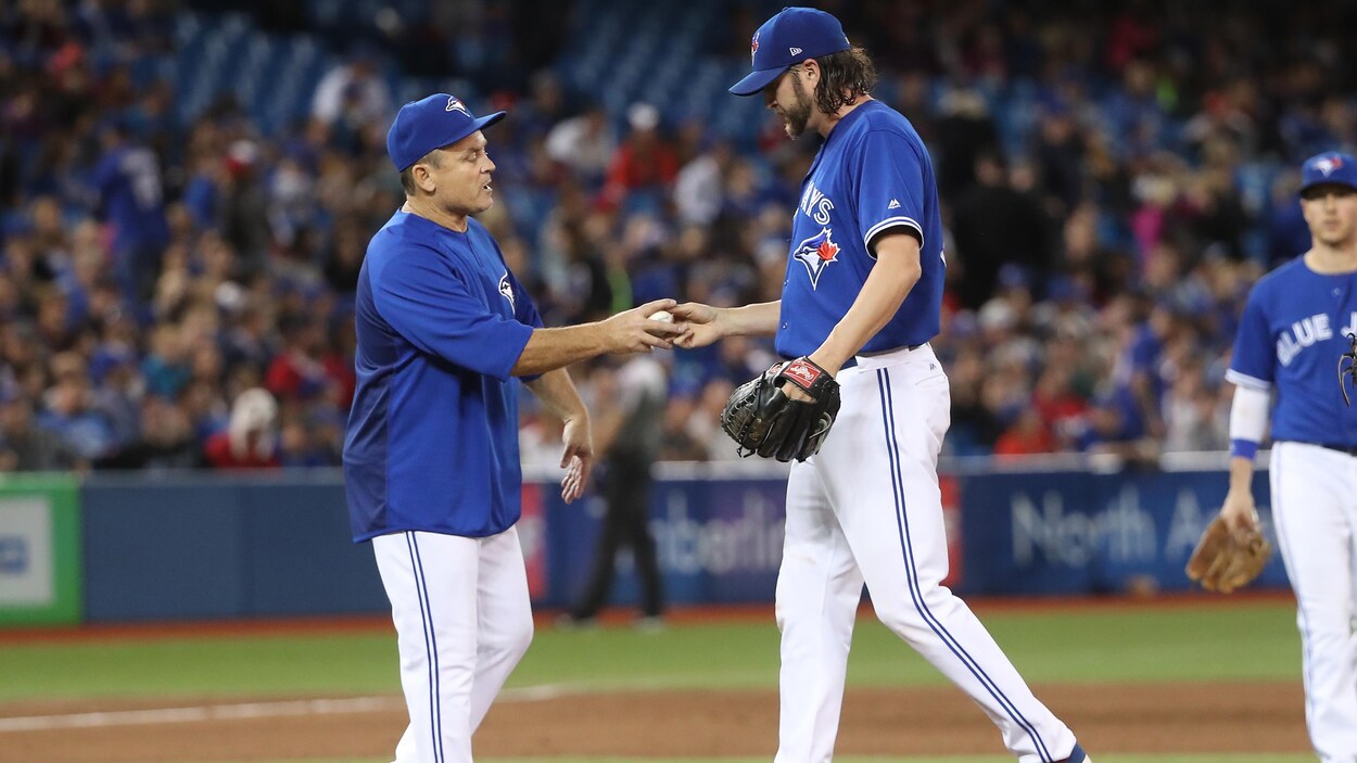 John Gibbons (gauche) et Jason Grilli (droite) John Gibbons (gauche) et Jason Grilli (droite)