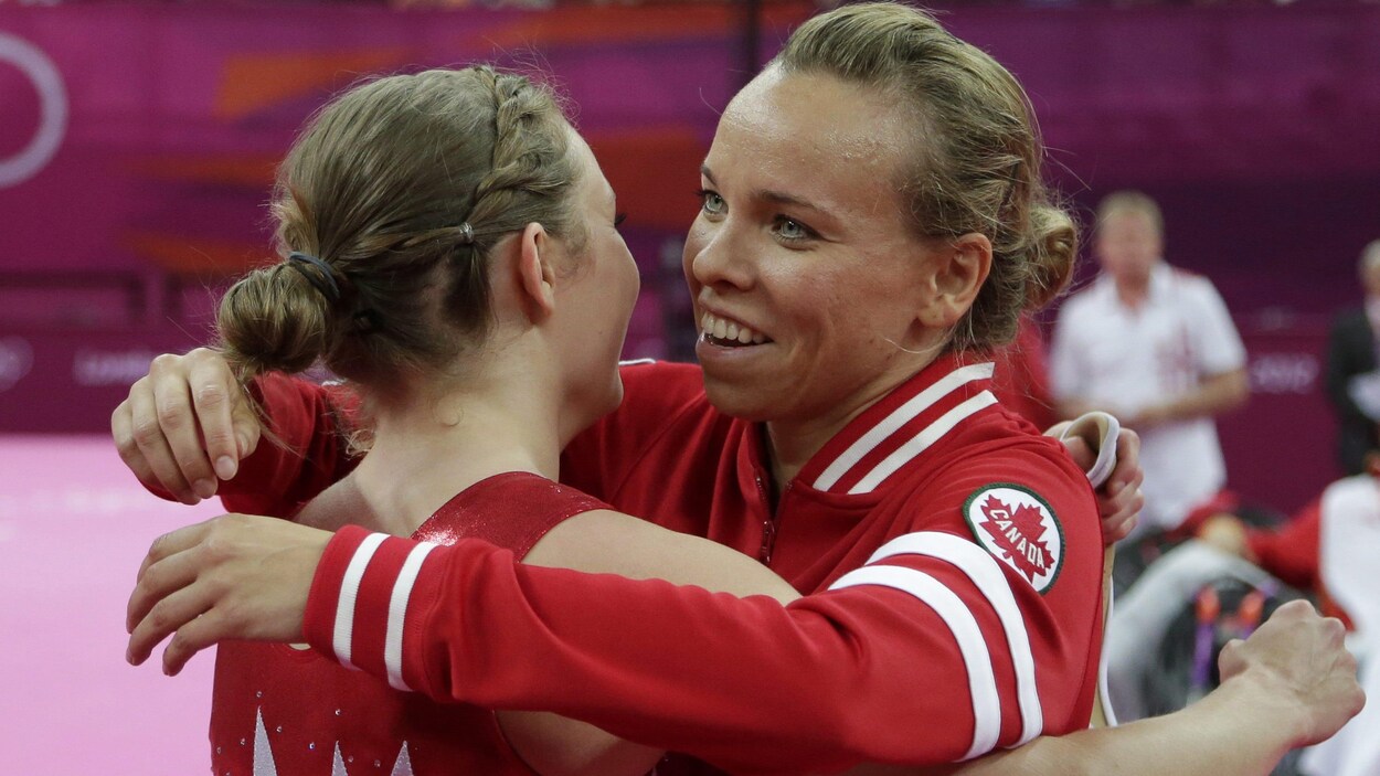 Karen Cockburn (à droite) avec Rosannagh Maclennan, aux Jeux olympiques de Londres en 2012 Karen Cockburn (à droite) avec Rosannagh Maclennan, aux Jeux olympiques de Londres en 2012