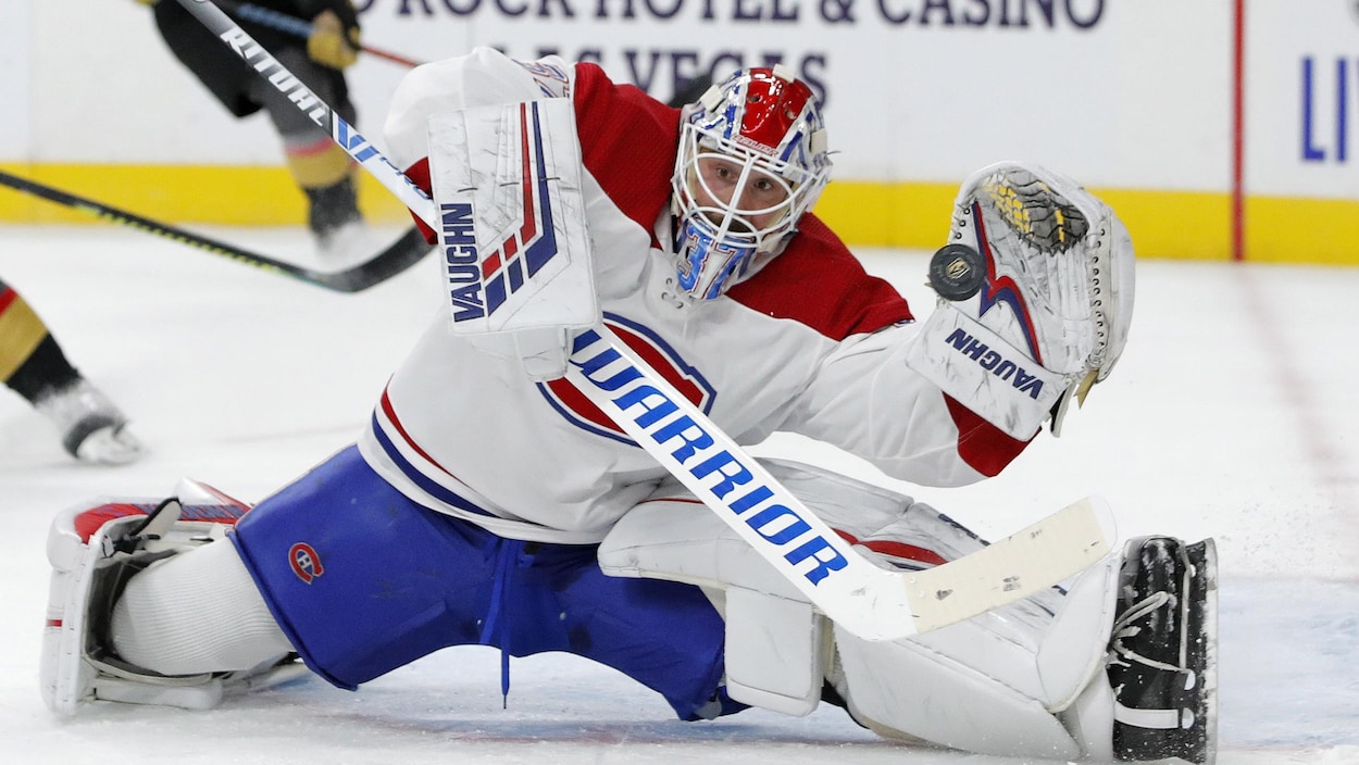 Le gardien de but du Canadien effectue un arrêt.