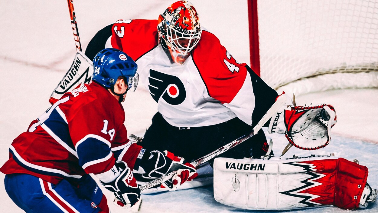 Martin Biron, des Flyers, effectue un arrêt de la mitaine devant Tomas Plekanec, du Canadien, lors du deuxième match de la série opposant les deux équipes, au printemps 2008. Martin Biron, des Flyers, effectue un arrêt de la mitaine devant Tomas Plekanec, du Canadien, lors du deuxième match de la série opposant les deux équipes, au printemps 2008.