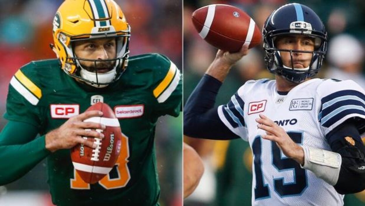 Mike Reilly des Eskimos court avec le ballon alors que Ricky Ray des Argonauts s'apprête à faire une passe Mike Reilly des Eskimos court avec le ballon alors que Ricky Ray des Argonauts s'apprête à faire une passe